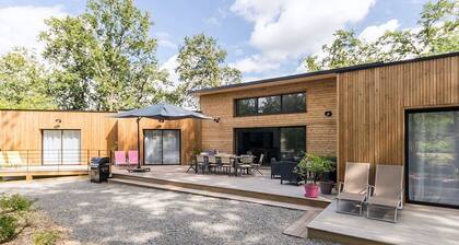 Spacious Modern Wooden House with Large Park, Terrace, and Game Amenities