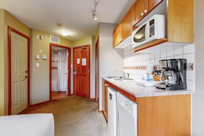 Microwave, stovetop, dishwasher, coffee/tea maker