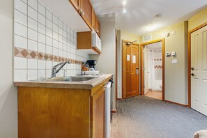 Microwave, stovetop, dishwasher, coffee/tea maker