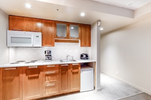 Microwave, stovetop, coffee/tea maker, toaster