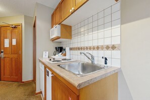 Microwave, stovetop, dishwasher, coffee/tea maker