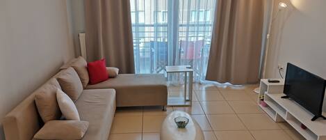 Apartment, Balcony | Living room | 32-inch flat-screen TV with satellite channels, LED TV