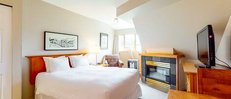 Tabla de planchar con plancha, wifi y ropa de cama