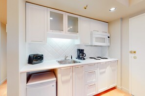 Microwave, stovetop, coffee/tea maker, toaster