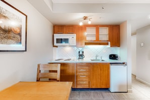 Microwave, stovetop, coffee/tea maker, toaster