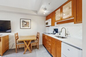 Microwave, stovetop, coffee/tea maker, toaster