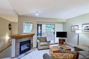 TV, fireplace - Lovely second-floor getaway with balcony views, pool, & hot tub - walk to lifts (Whistler)