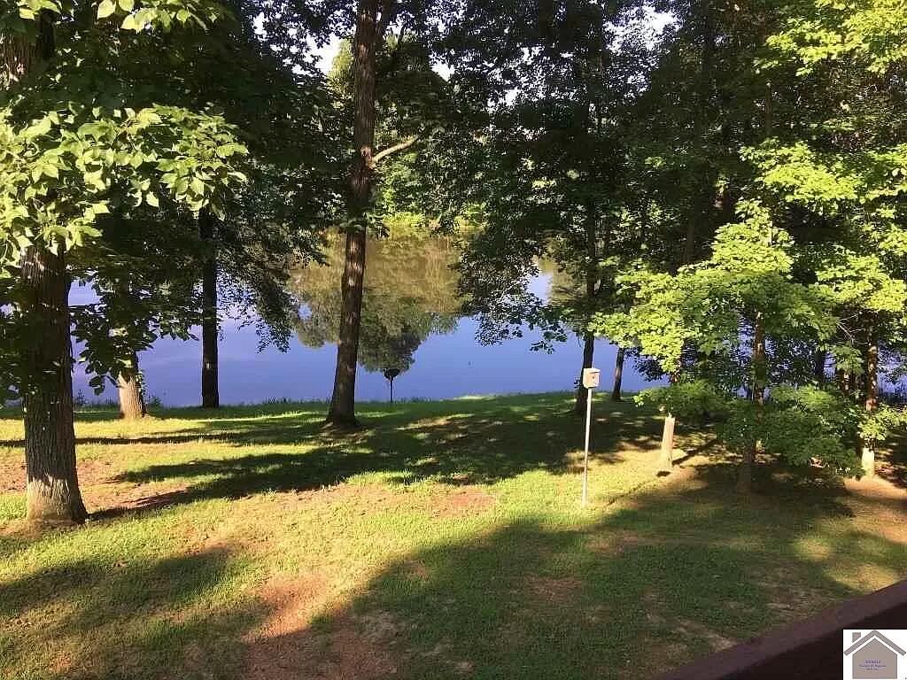 Large family home at LAKE BARKLEY sits on a 2.3 acre lot! 
