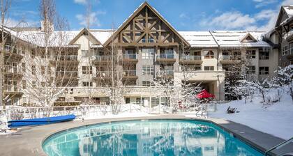 Deluxe ski-in/out condo with fireplace, balcony, pool, fitness center, & hot tub
