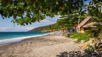 On the beach, sun loungers, beach umbrellas, beach towels