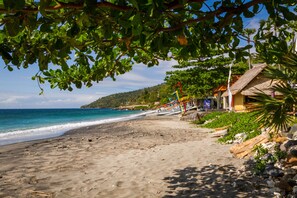 On the beach, sun-loungers, beach umbrellas, beach towels - Aquamarine Beach Villas (Karangasem)
