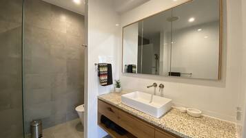 Bathtub, hair dryer, towels, soap