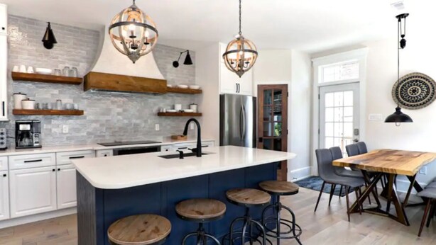 A modern kitchen with a central island, bar stools, and pendant lighting. - Just redone, 1 1/2 block from Ventnor beach (Ventnor City)