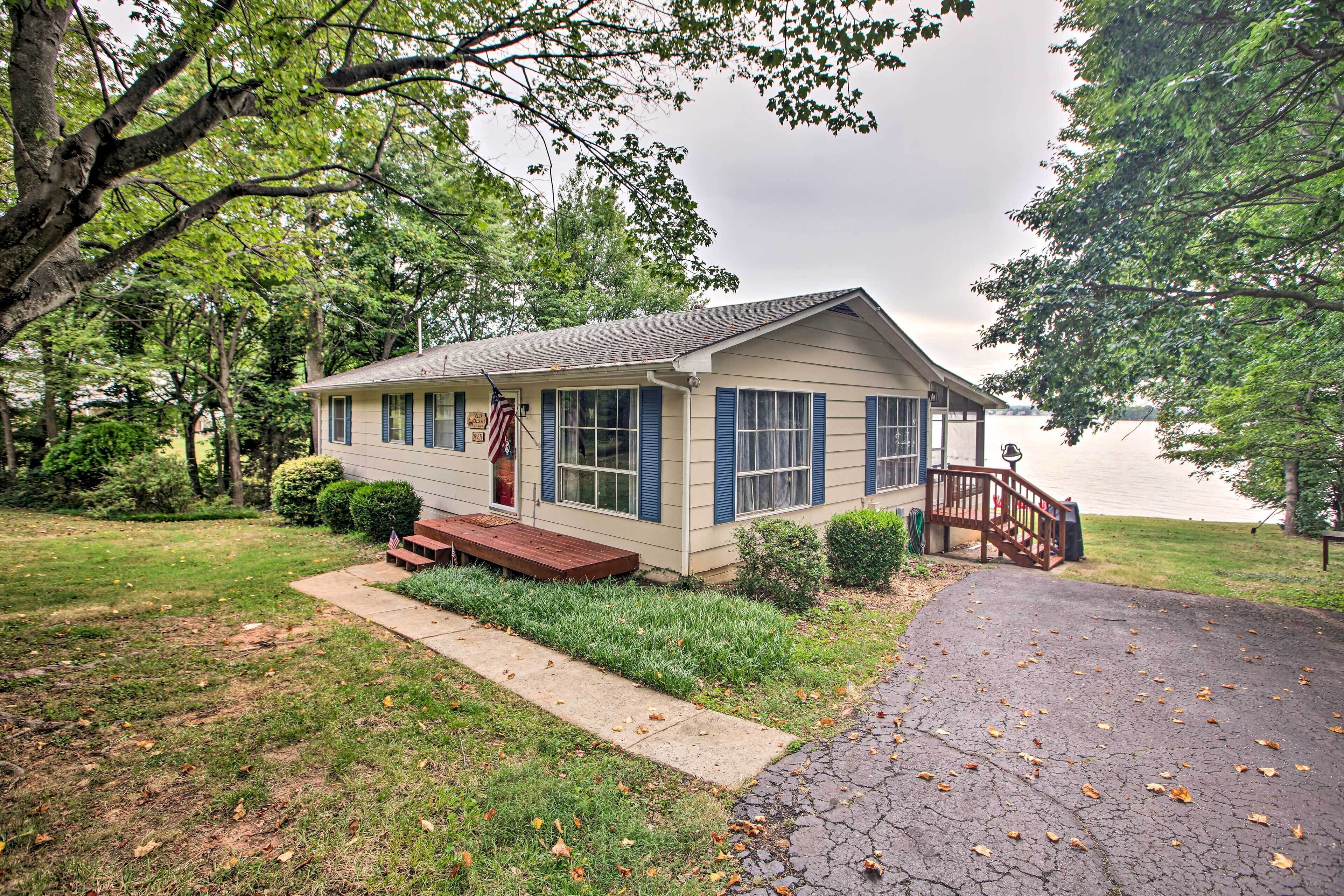 Lakefront Living with Dock, Fire Pit & Sunroom!