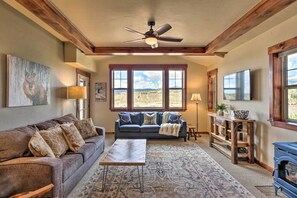 TV, fireplace, books - Fraser Condo w/ Views & Hot Tub: Near Winter Park! (Fraser)