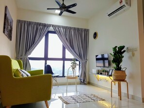 2 Bedroom Apartment A | Living area | 32-inch LCD TV with digital channels, TV