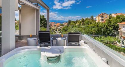 Villa Arabella Malinska - villa moderna con piscina climatizada, jacuzzi y terraza en la azotea