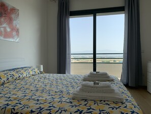 Panoramic Condo, 1 Bedroom (Golfo) | 1 bedroom, down comforters, iron/ironing board, free WiFi - Panoramic Sport Apartment (Cagliari)