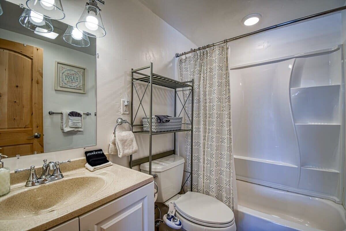 Bathtub, hair dryer, towels