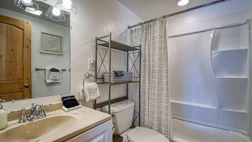 Bathtub, hair dryer, towels