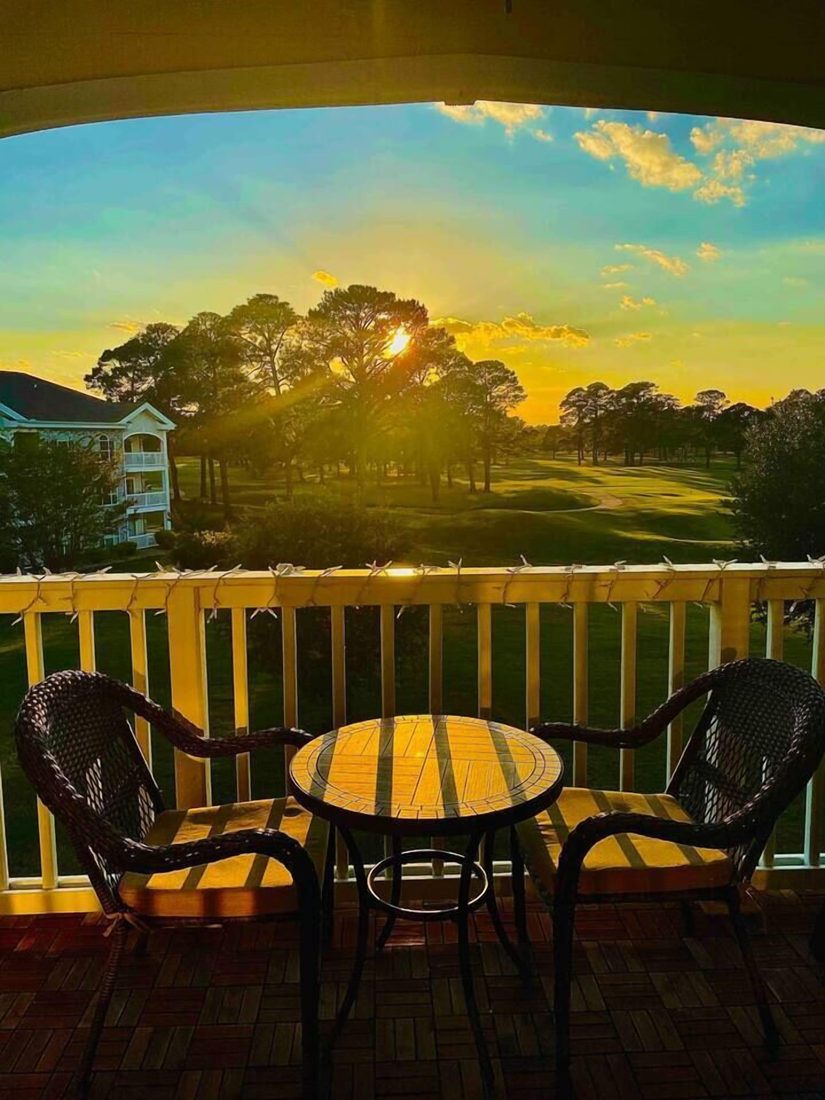 Sunset bliss Indulge in the ultimate vacation experience at our luxurious seventh-hole condo, boasting stunning panoramic views of the golf course from your private patio to soak up the sun while enjoying the peaceful surroundings.