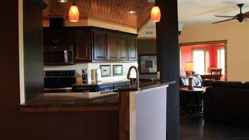 Condo, 2 Queen Beds, Balcony | Private kitchen | Fridge, microwave, stovetop, dishwasher