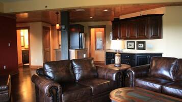 Condo, 2 Queen Beds, Balcony | Living room | TV, fireplace