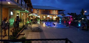 2 outdoor pools, open 10:00 AM to 8:00 PM, pool umbrellas, pool loungers