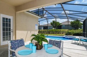 Outdoor dining - Great Pool Villa Near Disney (Davenport)