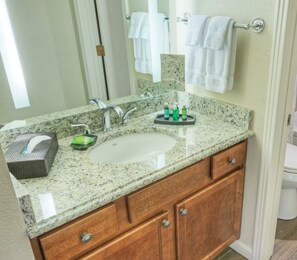 Bathtub, hair dryer, towels, soap