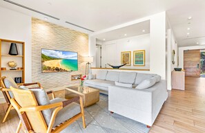 TV, fireplace, stereo - Maui Resort Rentals: Luana Garden Villas 17A – Modern 3BR Villa at Kaanapali’s Newest Luxury Residences! (Lahaina)
