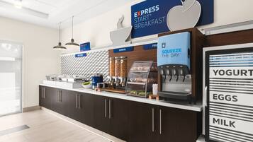 A modern breakfast bar with a sign for 'EXPRESS START BREAKFAST', a coffee machine, and labeled containers for yogurt, eggs, and milk.