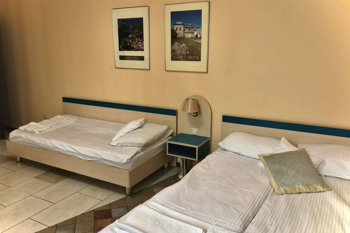 Desk, laptop workspace, free WiFi, bed sheets