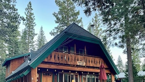 A lodge with a wooden exterior, a balcony, and a staircase leading to the entrance. - Close drive to lake * Dog OK * Great Family Home (Carnelian Bay)