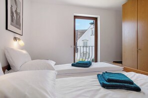 2 dormitorios, tabla de planchar con plancha, wifi gratis y ropa de cama