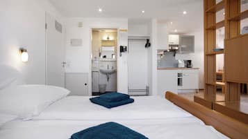 1 Schlafzimmer, BĂŒgeleisen/BĂŒgelbrett, kostenloses WLAN, BettwĂ€sche