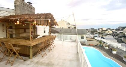 POOL, TIKI BAR, WATERFRONT  home, 8 LBI Beach passes in Mystic Island NJ