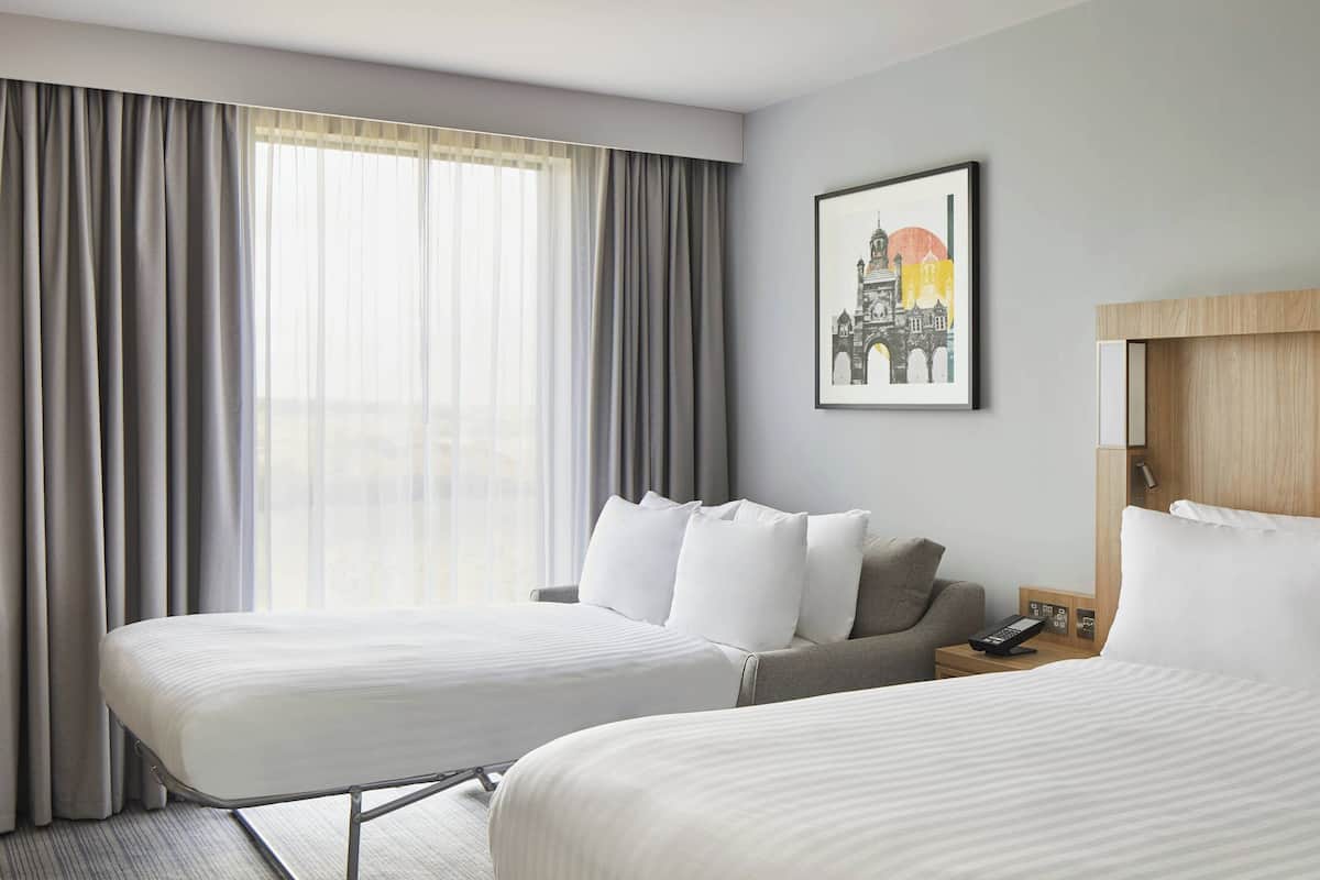 family room, 1 king bed with sofa bed, non smoking | 1 bedroom, hypo-allergenic bedding, minibar, in-room safe