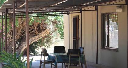 Comfy room with dstv and aircon in convenient location