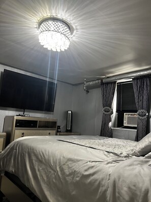 1 habitación, tabla de planchar con plancha, wifi gratis y ropa de cama 