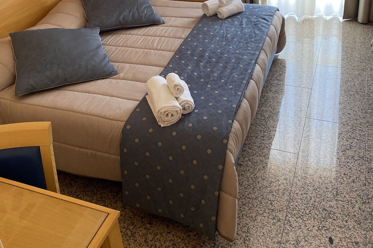 Down comforters, desk, laptop workspace, WiFi (free)