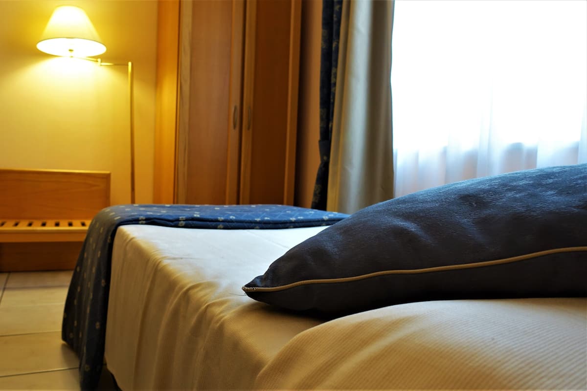 Down comforters, desk, laptop workspace, WiFi (free)