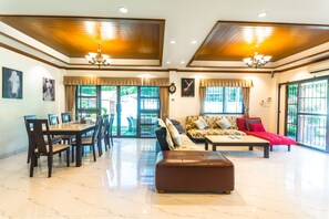 4 Bedroom Pool Villa | Living area | Flat-screen TV
