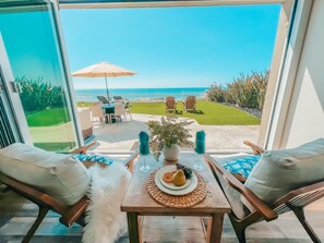 Outdoor dining - LOWER LEVEL Pet Friendly Oceanfront Condo P919-0 (Oceanside)