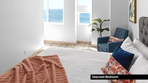 A Seacoast Bedroom with a large bed, a chair, and a view of the ocean. - UPPER LEVEL Pet Friendly Oceanfront Condo P923-0 (Oceanside)