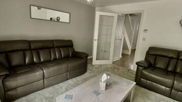 Three-Bedroom House | Living area | Smart TV