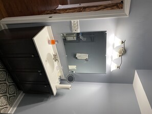 Combined shower/tub, hair dryer, towels, soap