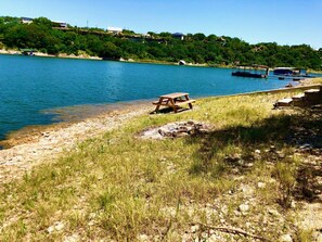 Beach - Jolene's Airstream: Enjoy lake views sitting on the porch with lake/dock access (Spicewood)