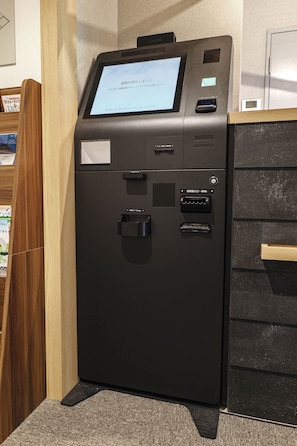 Sisään- ja uloskirjautumisautomaatti