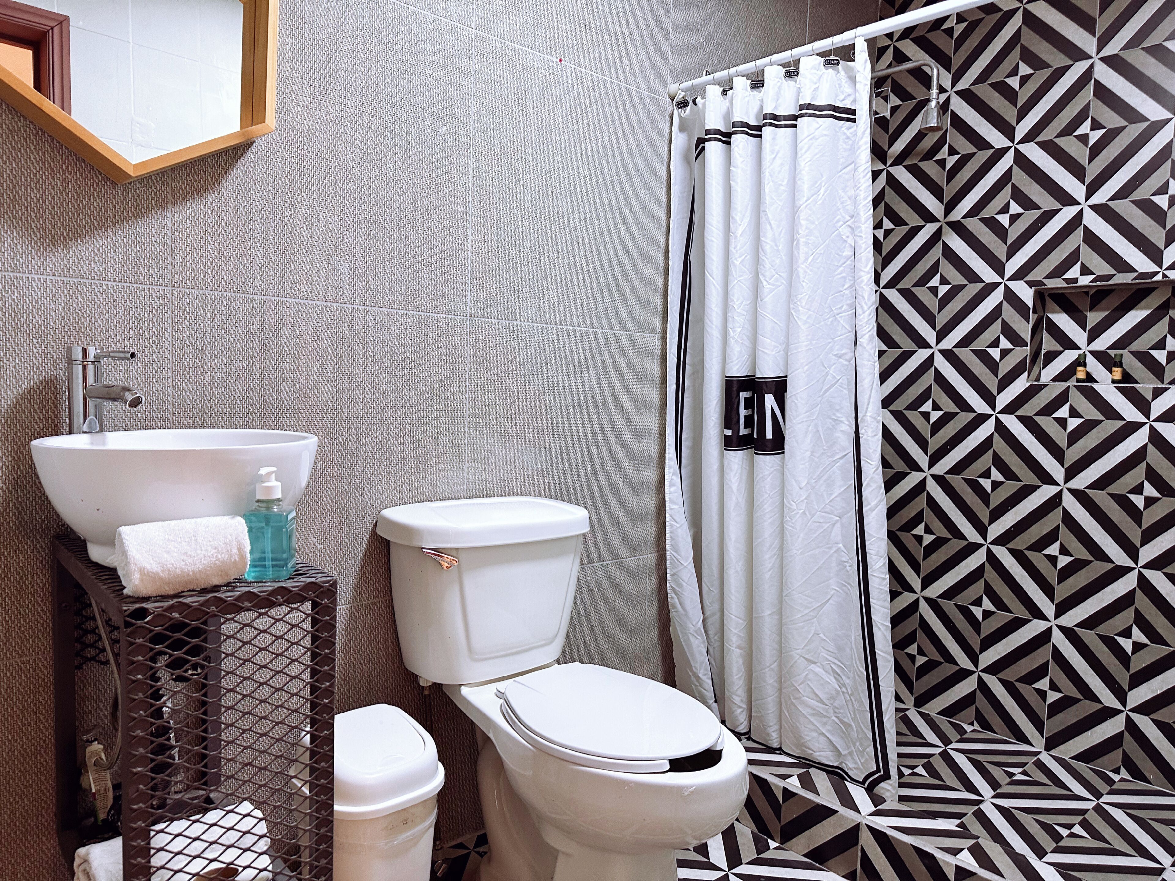 Hair dryer, towels, soap, shampoo